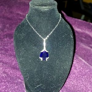 Nice necklace with sapphire colored stone on 10in chain.
